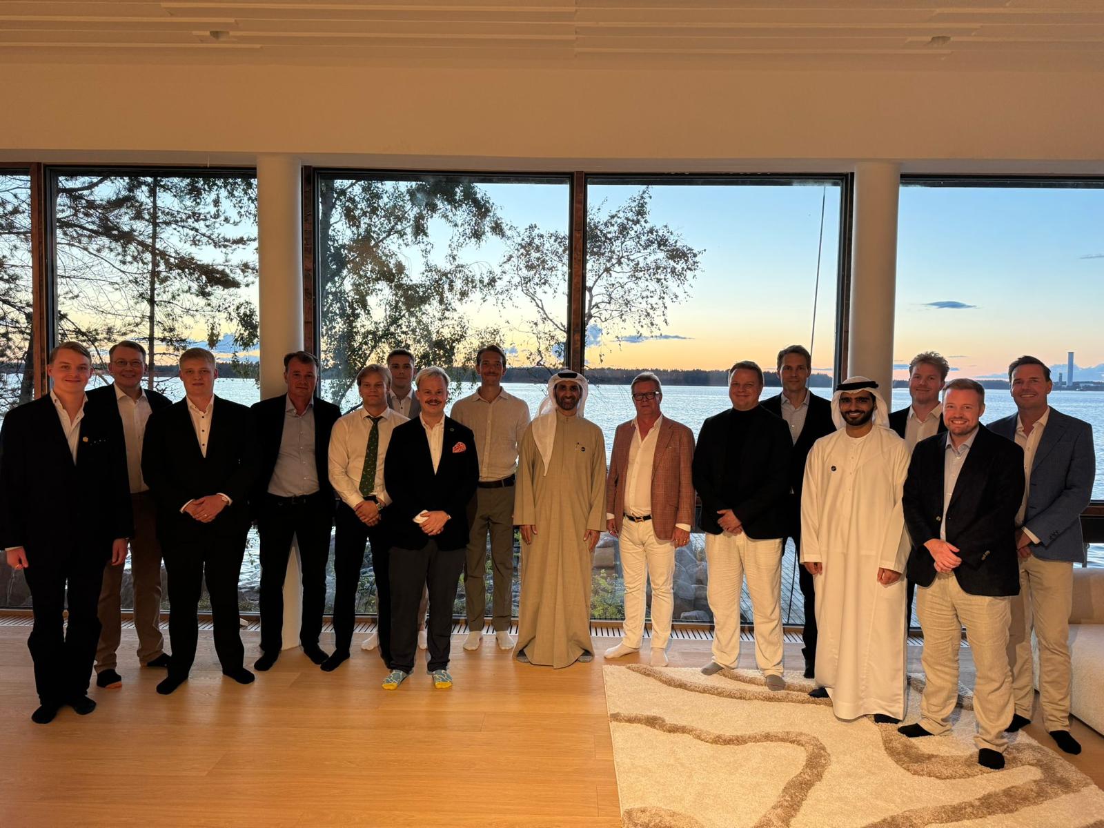 Founding members of the Pohja & Pearl Foundation gathered at a lakeside house in Finland at dusk